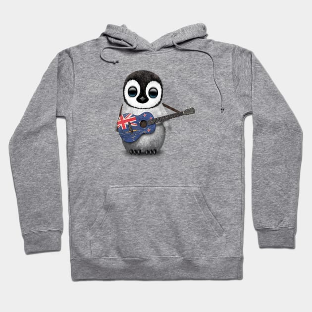 Baby Penguin Playing New Zealand Flag Guitar Hoodie by jeffbartels